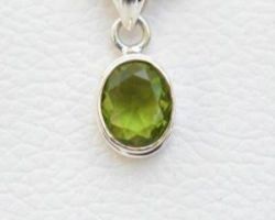 Peridot pendant Silver caping Peridot Silver locket