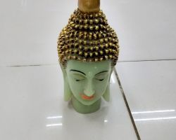 Buddha statue white marble Raisin